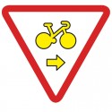 Autorise les vélos à franchir les feux s'ils veulent tourner à droite
